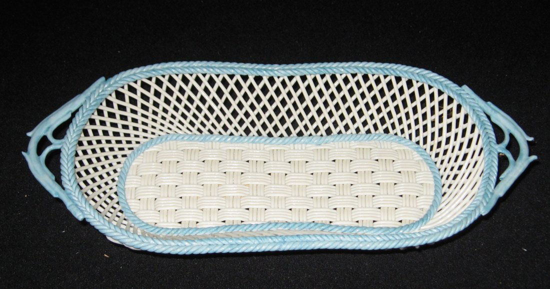 Belleek four stand "Twig Basket weave" basket,: Elongated four with blue rope twist rim and handles, marked 10 1/2" long.