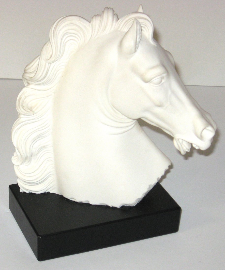 A Arnaldo Giannelli alabaster horse head,: Carved horse head set on a wood base, signed A Gimmelli Italy 9" ht. note: Born in Volterra Italy Arnaldo was the president of the Alabaster craftsmen guild in 1953, his most famous work is of Dwight 