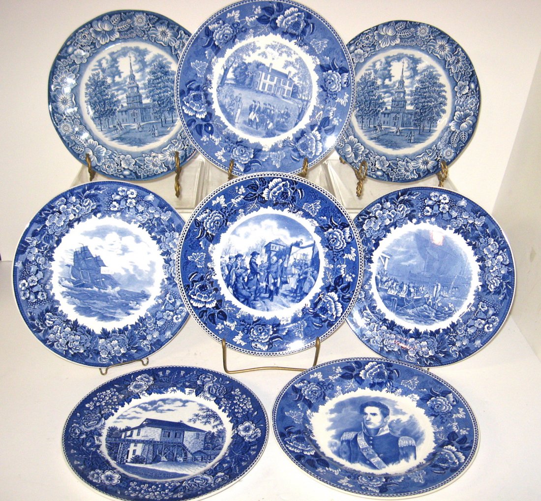 Group of eight English blue pottery plates,: Produced at Wedgwood, Staffordshire and Adams each depicting a scene from American history, including Old Ironsides, The Harrison Mansion, The Boston Tea Party, Centennial of William Henry Harrison, C