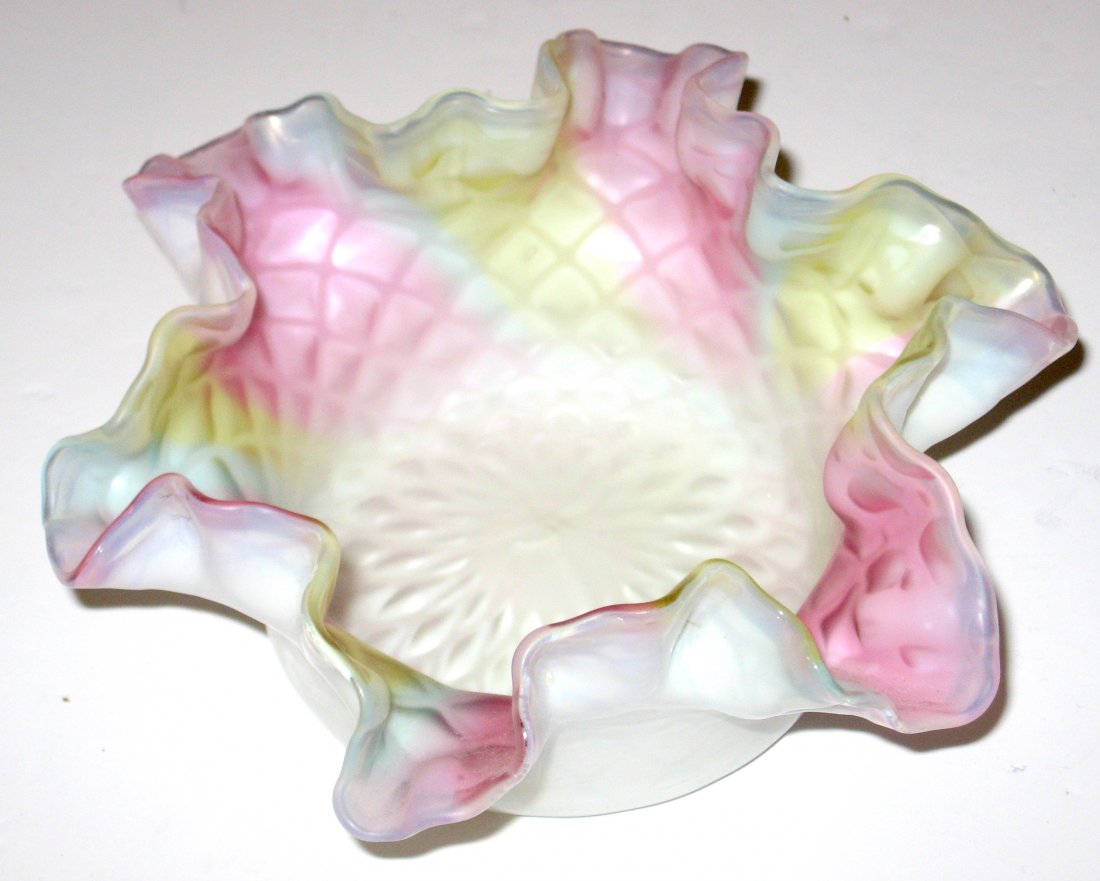 Magnificent Webb MOP rainbow DQ bowl,: Crimped ruffled rim Mother of Pearl bowl in striations of red, blue, and yellow in the diamond quilted pattern, signed Patent, 5 1/2' wide.