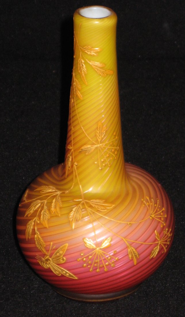 Stevens and Williams Pompeiian Swirl vase,: Bottle form in amber shading to rose decorated with a cascading fern and two butterflies, 6 1/2" ht.