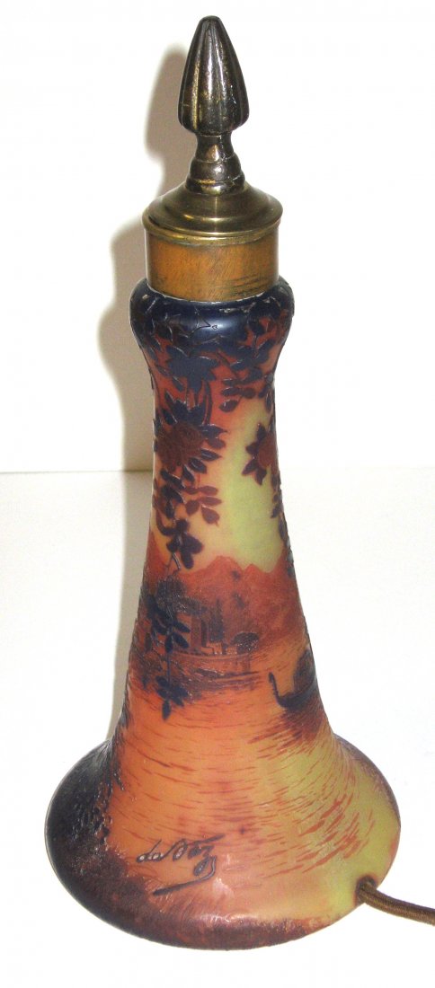 Devez French cameo table lamp,: Reverse trumpet form decorated with a mountainous lake scene of a boat passing an Italian Chalet, signed in cameo Devez, 11 1/2" ht.