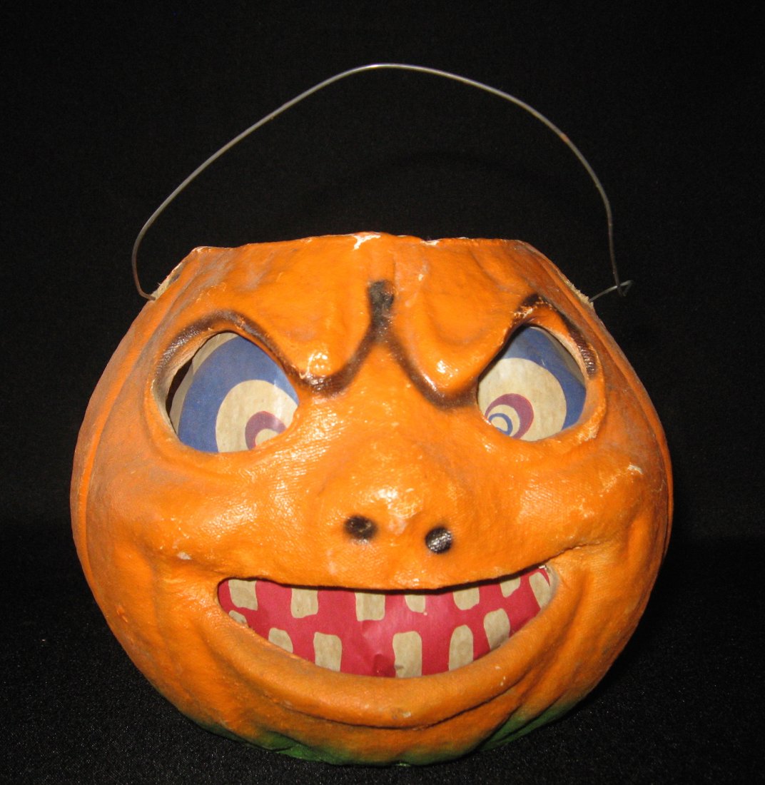 Large 1930's paper mache Jack-o-lantern,: Pumpkin with the original paper evil face, 6" ht.