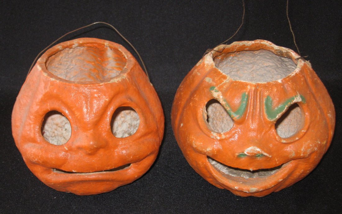 Two Paper Mache Jack-o-lanterns,: Large size one with a happy face, one with a sad face, 6" ht.