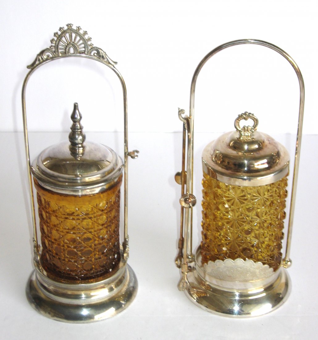 Two amber pickle castors, (1 of 3)