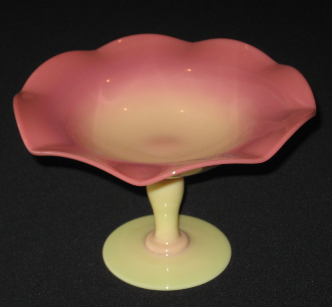Pairpoint Burmese glass compote,: Footed Robert Bryden period compote in a glossy finish, 7" wide.