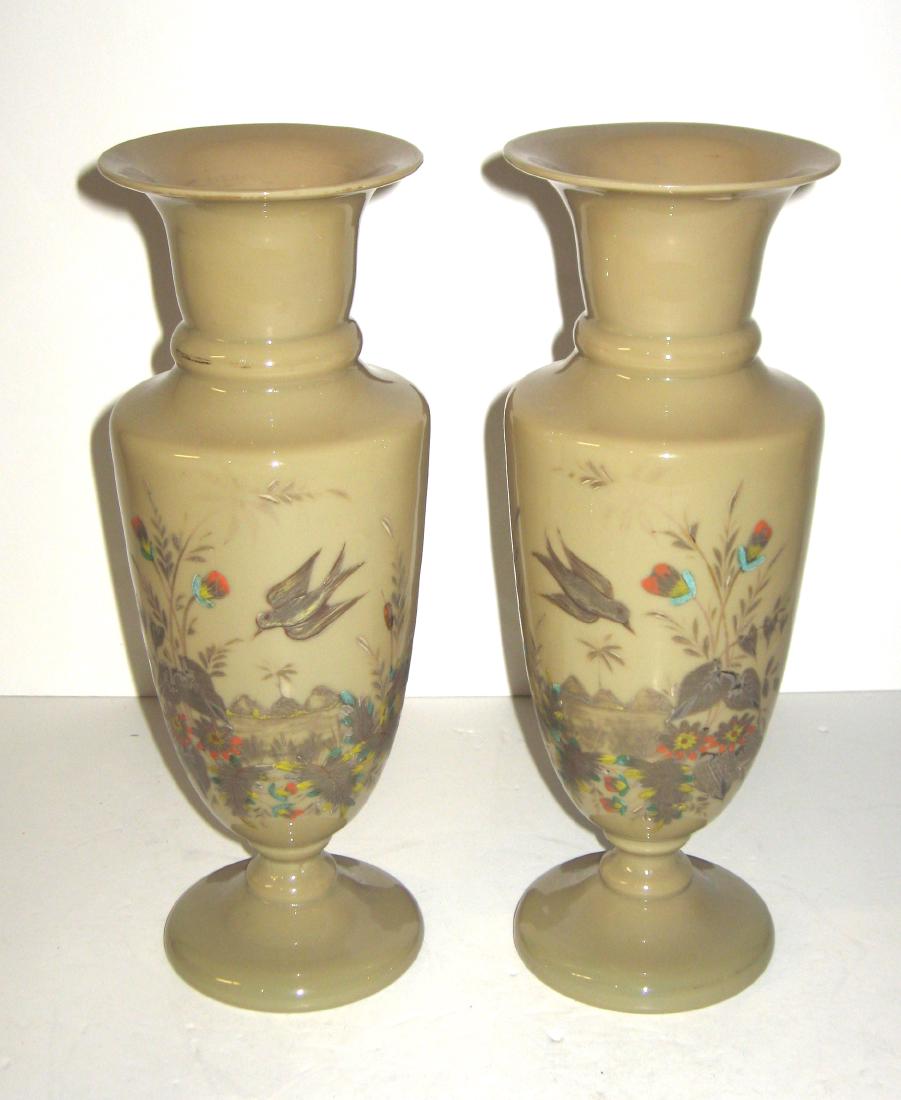 Pair of French opaline glass vases,: Footed urn form in tan homogenized glass decorated with birds and foliage, 12" ht. Condition: good with no chips cracks or repairs