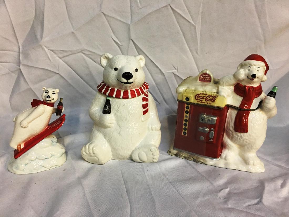 COCA-COLA COIN BANK, COOKIE JARS: Coca-cola polar bear coin bank Always sking Jumping 1995 7" Polar bear cookie Jar 10" Polar bear leaning on vending machine cookie jar 10"