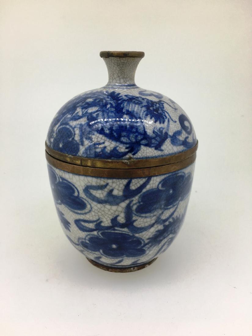 BLUE AND WHITE JAR WITH LID: CAMBODIAN, MARKED ON BOTTOM, 5" TALL