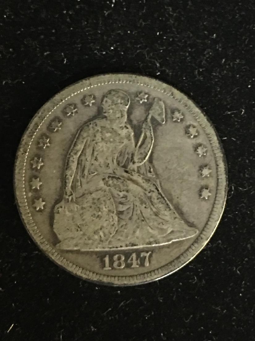 1847 SEATED DOLLAR (1 of 2)