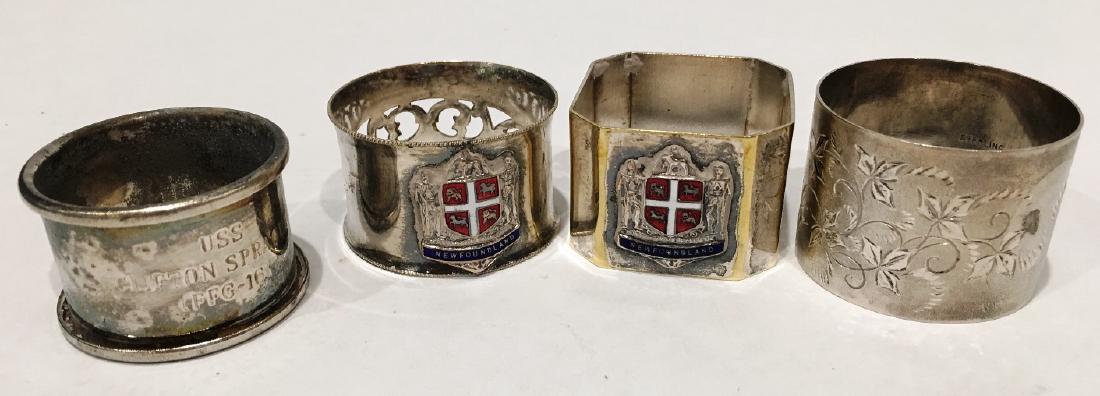 4 UNIQUE SILVER NAPKIN RINGS: 1 MARKED "USS CLIFTON SPRAGUE FFG-16", 2 MARKED "NEWFOUNDLAND