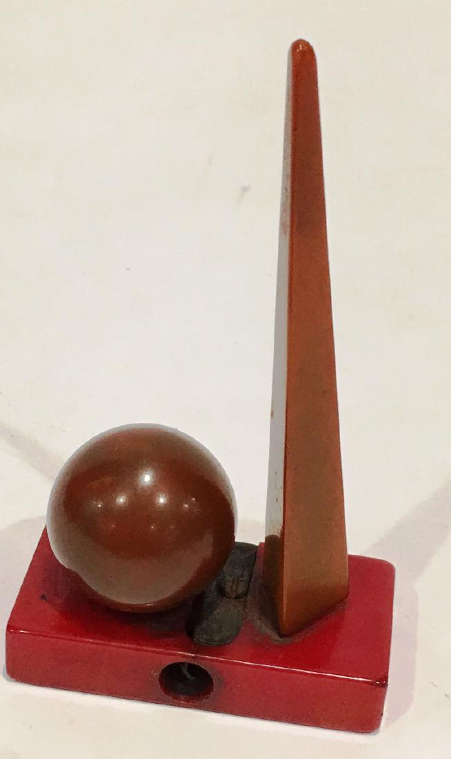 BAKELITE PENCIL SHARPENER: WORLDS FIAR, 4" TALL