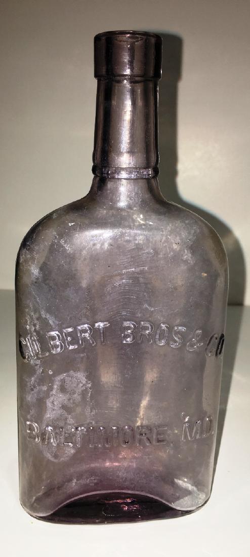GILBERT BROS AND CO. BALTIMORE BOTTLE: 8" TALL, PURPLE
