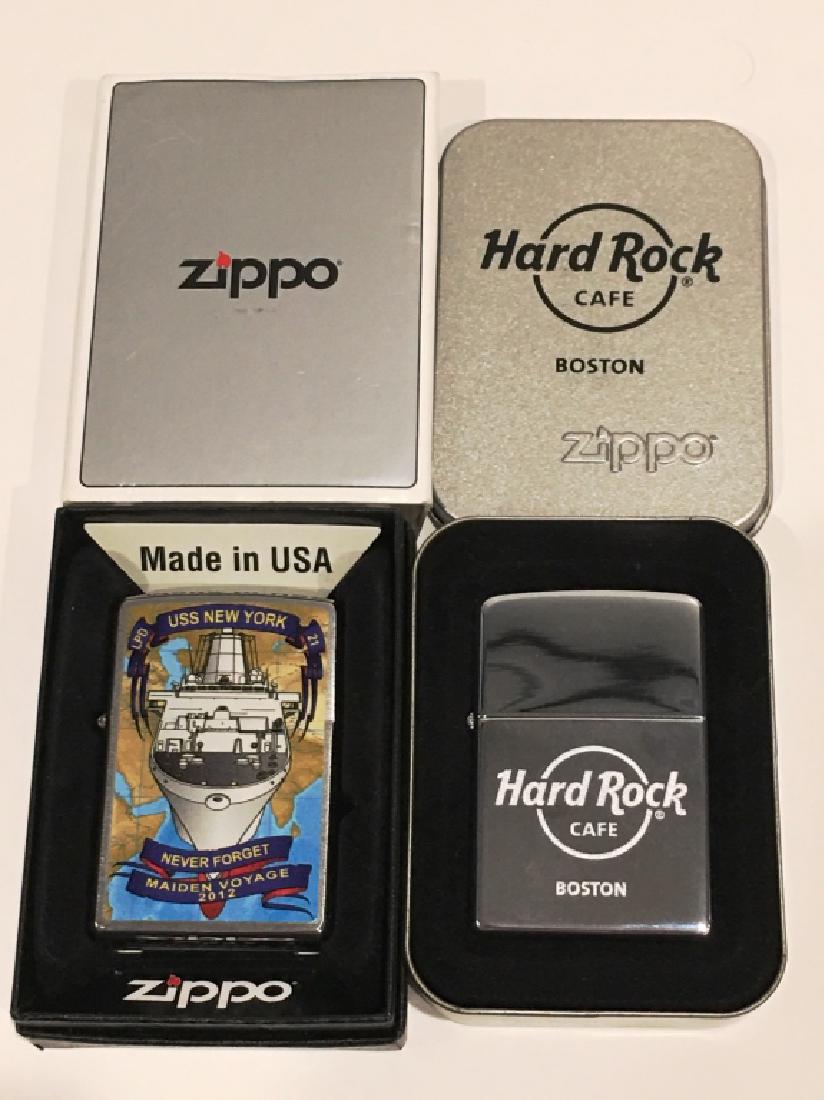 2 ZIPPO LIGHTERS: 1 HARD ROCK CAFE BOSTON (UNUSED), 1 USS NEW YORK MAIDEN VOYAGE 2012 (UNUSED)
