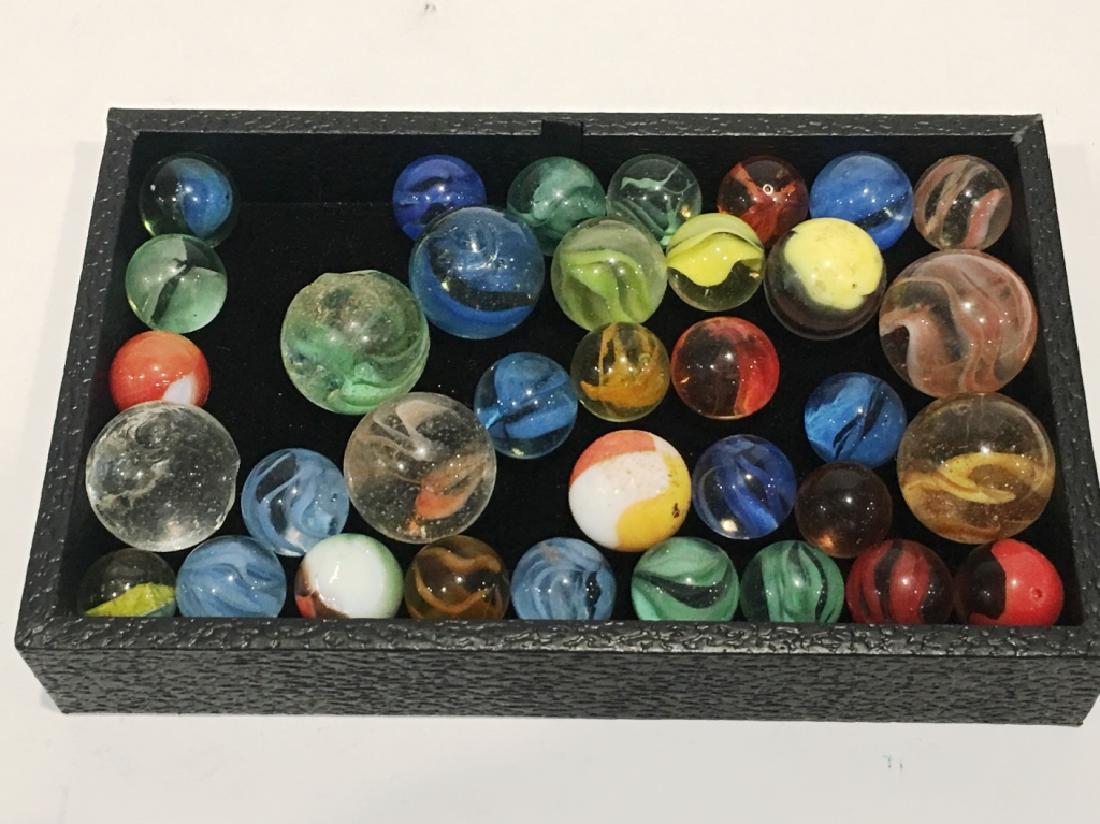 APPROX. 35 ASSORTED MARBLES: 35 IN NUMBER