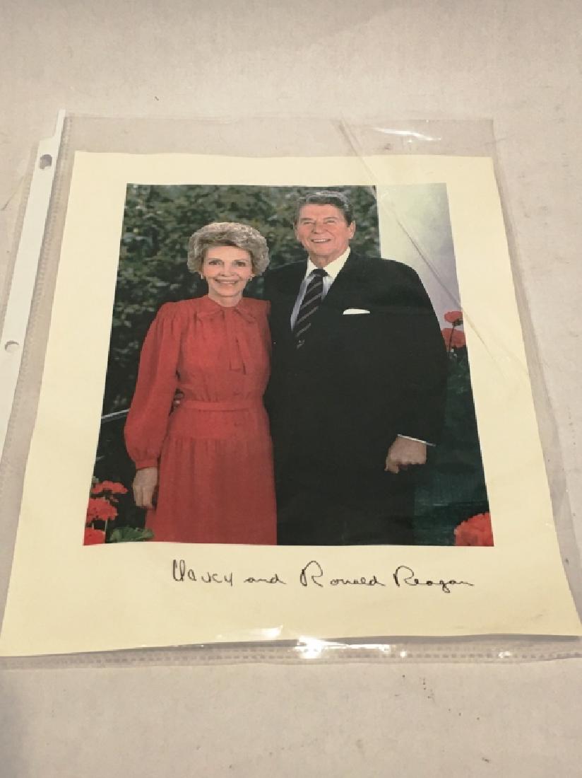 SIGNED PHOTOGRAPHED OF RONALD REAGAN: SIGNED "NANCY AND RONALD REAGAN", 1996 ALZHEIMER SUPPORT PHOTO, 8" X 10"