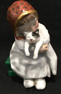 MEISSEN HENTSCHEL PORCELAIN FIGURINE: MODELED BY HENTSCHEL 1905, MEISSEN PRODUCTION 1905-1910, A CHARMING DEPICTION OF A LITTLE GIRL HUGGING HER CAT, 5" X 3.75", MARKED ON BOTTOM W427, AS IS SEE PHOTO