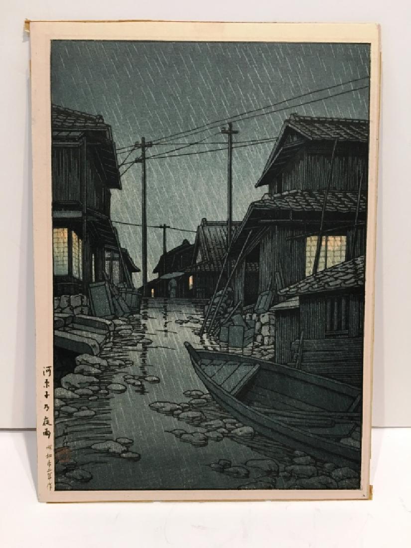 KAWASE HASUI JAPANESE WOODBLOCK: EVENING RAIN IN KAWARAGO , (1883 - 1957), FRAMED, 14" X 18.75", SIGNED IN LOWER LEFT CORNER SEAL IN LOWER RIGHT