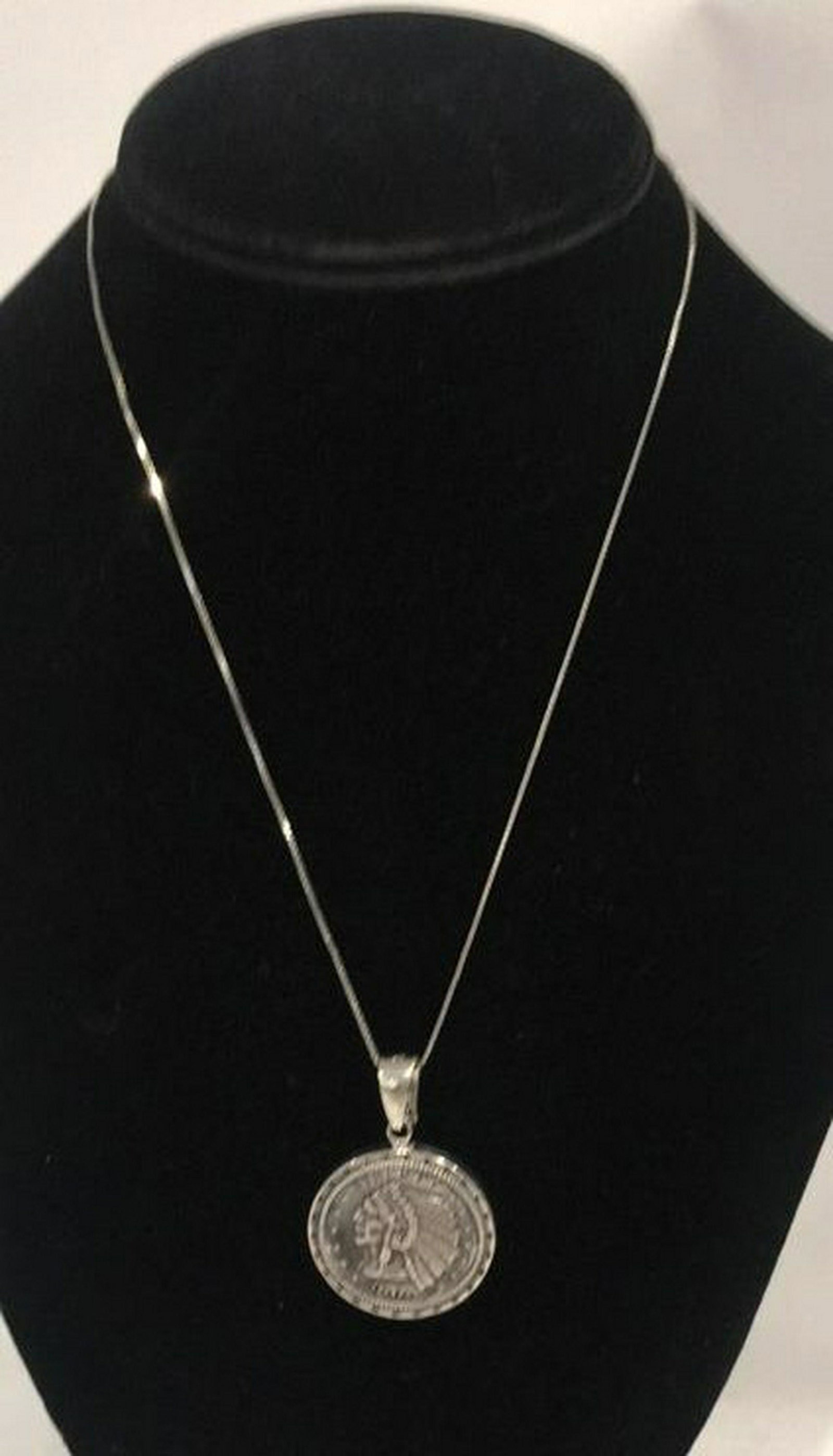 Sterling necklace mock liberty 1910 coin: Coin encased in Sterling, chain is sterling too, 15g