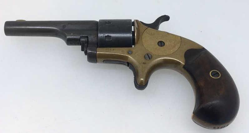 Colt 1871 open top short revolver: Blue steel, 22 short caliber, Seven shot