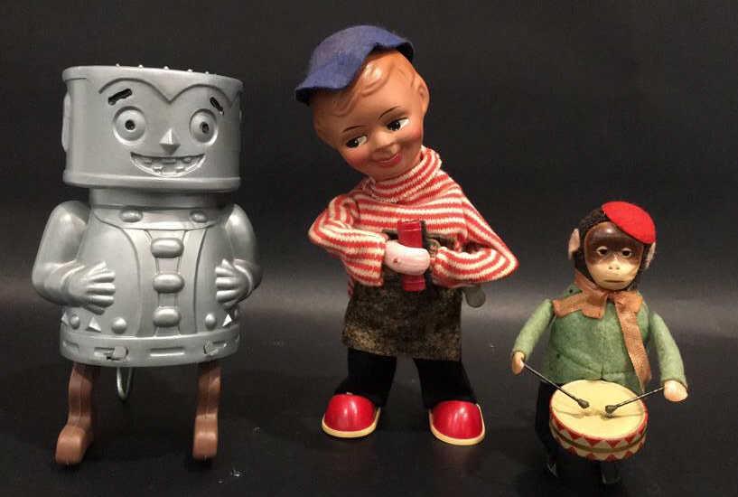 Vintage wind up toys: Schuco Wind up monkey drummer 4 1/2 inches tall, West Germany wind up toy 6 5/8 inches tall, made in Japan wind up toy 6 inches tall, all functioning