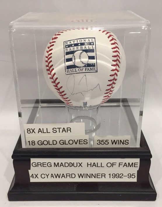 Greg Maddux Signed Baseball W/ JSA Cert: With JSA certification sticker H97433, with case