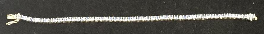Sterling Tennis Bracelet with Topaz Stones: 10 grams total weight, 7.25 inches long