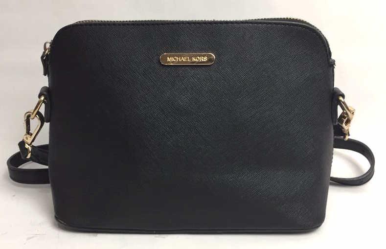 Michael Kors Purse: Reproduction, not authentic, 7 inches by 10 inches, with shoulder strap