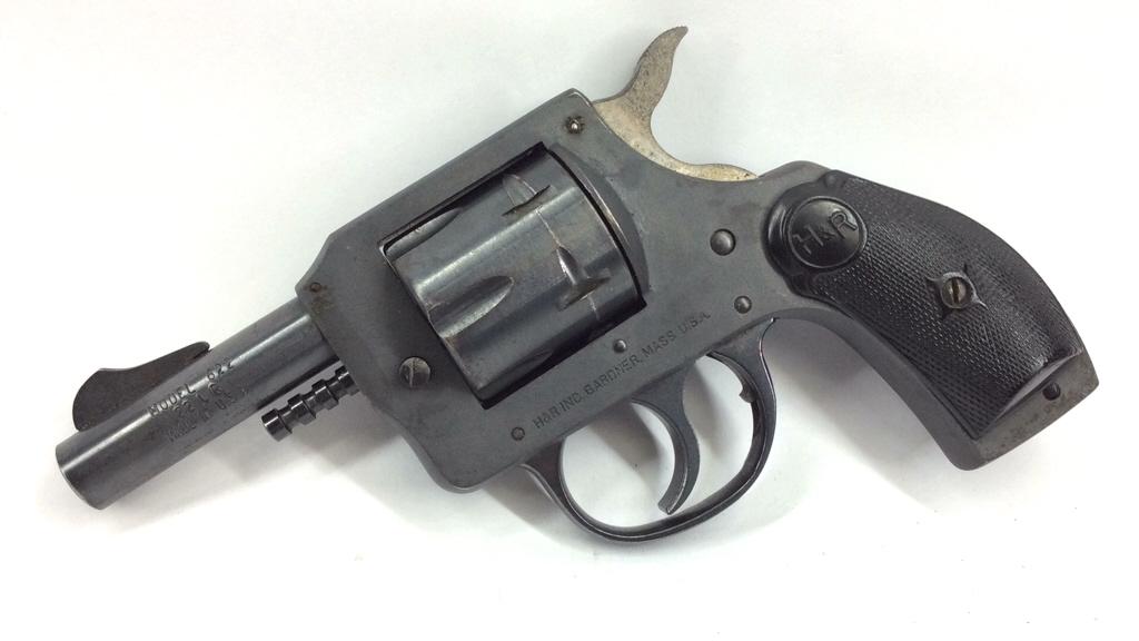 H&R Model 622 Revolver: .22 LR, solid frame, DA, 6 shot, 2.5 inch barrels, blue finish, square butt, plastic grips, pull pin cylinder release. Mfg. 1957-1973., see photo