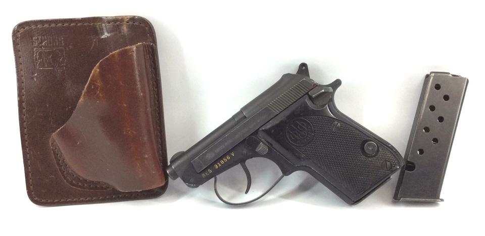 Beretta Model 21A .25 cal. Pistol: With extra magazine, and leather holster, see photo