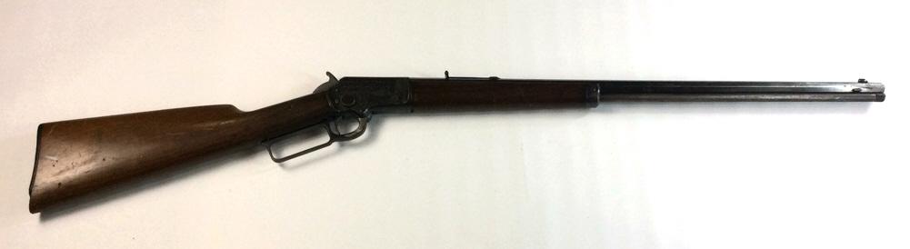 Marlin Model 97 Lever Action Rifle: .22 cal. LR, octagonal barrel, great engraving on sides, missing two screws, some damage to stock, see photo