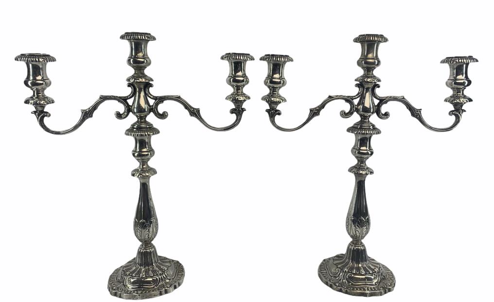 Pair of Fred Hirsch Co. Sterling Candelabras: Weighted, 3 lite, Hallmarked on the bottom, 14 inches by 16.25 inches, 2,846 grams total weight, see photo one has damage on base