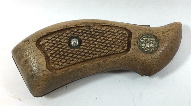 Smith and Wesson Wood Grip: See photo