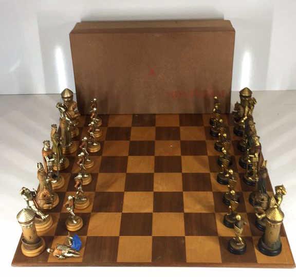 Anri "Montsalvat" Chess Set: Anri "Montsalvat" Chess Set, c. 1969, Italy, carved and polychromed wood chess pieces depicting King Arthur and the Knights of the Round Table, with original box, gameboard, king height 5.5 inches, on