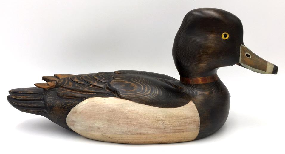 Handcrafted Tom Taber Wooden Duck Decoy: 1989-1990 season, glass eyes, 16 inches by 7 inches by 5.75 inches, stamped on bottom, see photo