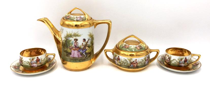 5 Piece Rosenthal Donatello Austria Tea Set: Two cup and saucer sets, Lidded Jar, tea pot, marked on bottom, largest 6 inches by 7 inches, see photo