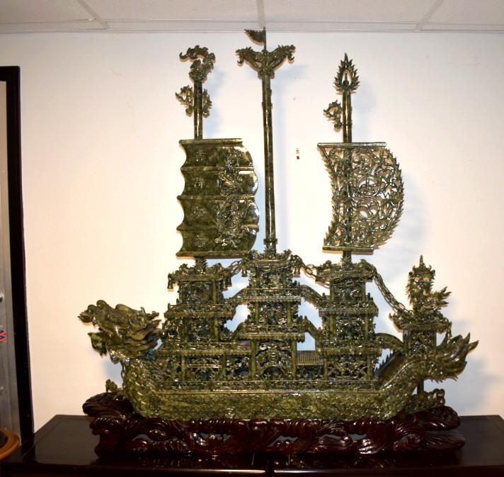 Large Spinach Jade? Dragon Ship: Extraordinary large ship, heavily carved, with three masks (only two sails, one is broken - we have the pieces from client), nearly 5 feet across (57 inches), 7 inches deep; the base measures 54 inche