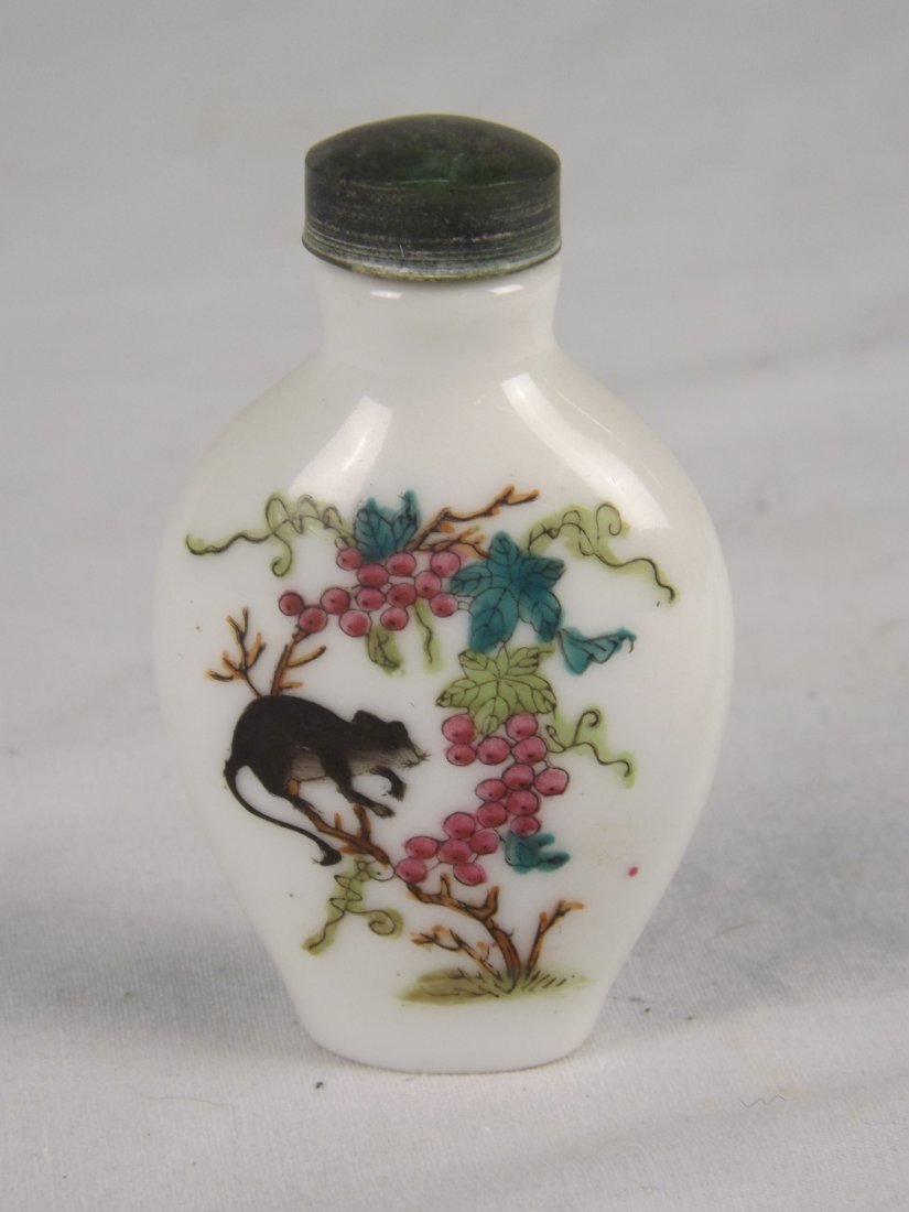 Snuff bottle, Racoon after Fruit: Snuff bottle, racoon after fruit in tree, with markings, 2 1/2"