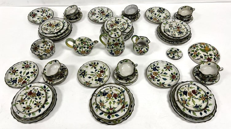 62 Pieces Cantagalli Italy Faience Majolica: 12 cups, 9 saucers, 6 bread and butter plates, 6 dessert plates, 9 salad plates, 7 luncheon plates, 7 dinner plates, 1- 3 footed bowl, 2 lids, coffee pot, tea pot, creamer, marked on bottom, see photo