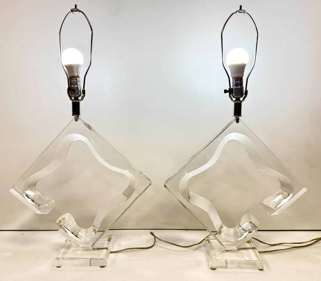 Pr of Van Teal Signed Acrylic Table Lamps: A pair of sculptural, modern table lamps (Total count: 2 items) made of clear acrylic/Lucite with chrome fittings, featuring a diamond-shaped body with interior cutouts, and each lamp is visibly signe