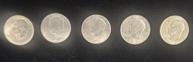 5 One Dollar Ike Coins