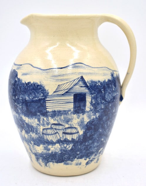 Michael & Melvin Crocker Folk Art Pottery Pitcher: Hand painted scene of barn in blue, signed on bottom and on side, 9.75 inches by 8 inches, no damage, see photos