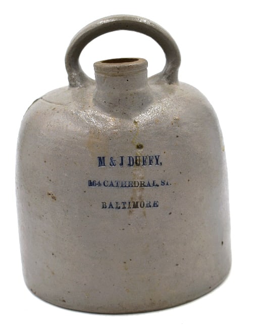Antique M&J Duffy Baltimore One Gallon Liquor Jug: Salt-glazed, circa 1875–1890, stamped on front M&J Duffy, 164 Cathedral St. Baltimore, top loop handle, 8.5 inches by 6.75 inches, no damage, see photos