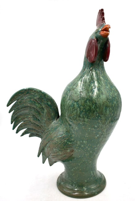 Charlie West Georgia Folk Art Roster Sculpture: 19.75 inches by 13 inches, smooth body, speckled emerald green glaze, chipping damage to tail feathers, see photos