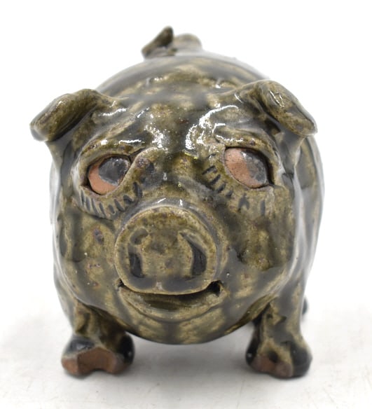 Cleater and Billie Meaders Folk Art Pottery Pig: 3.75 inches by 4.75 inches, tobacco spit green glaze, signed and dated 10-1995 on the bottom, slight kiln pull damage to feet, see photos