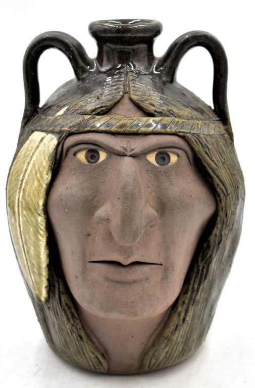 Michael & Melvin Crocker Native Folk Two-Faced Jug: 10 inches tall by 7.5 wide, traditional two-faced native folk jug by Michael and Melvin Crocker, signed and dated 1995 on bottom, no damage, see photos.