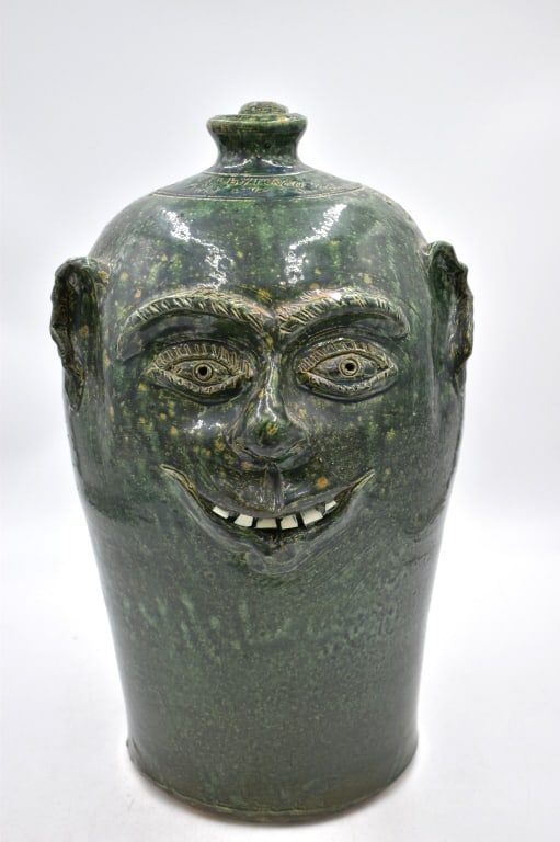 Bobby Ferguson Green Glaze Face Jug: 18 inches tall by 9.5 inches wide, green glazed Bobby Ferguson traditional folk piece, signed on top, no damage, see photos.
