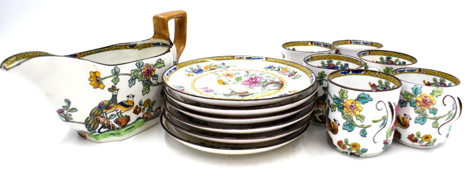 13 Piece Copeland Tea Set: 3.75 inches tall by 7 inches wide gravy boat, 6 tea cup plates at .5 inches tall by 4.75 inches wide, and 6 tea cups at 2 inches tall and 2 inches wide, chip on gravy boat spout, see photos.