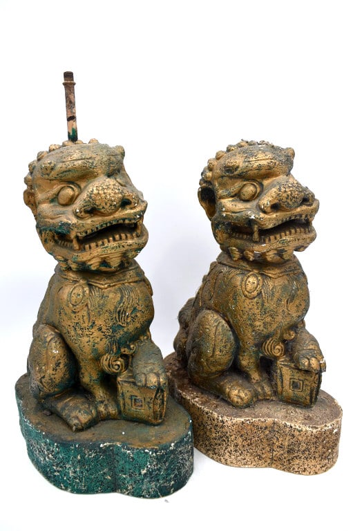 Pair of Plaster Foodog Lamp Figurines: One measures in and 16.25 inches tall and 10 inches wide while the other is 13.5 inches tall and 10 inches wide, unmarked, one is missing top of lamp stem, see photos.