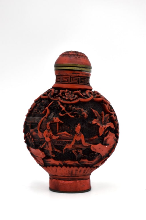 Hand Carved Cinnabar Snuff Bottle: 2.5 inches tall by 2 inches wide, marked on bottom, no damage, see photos.